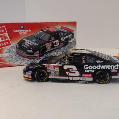 Sale Photo Thumbnail #934: Action Racing No Bull Limited Edition Dale Earnhardt 76th Win 2000 Monte Carlo GM Goodwrench with Original Box.  No Bull edition is replica condition of finish line car.