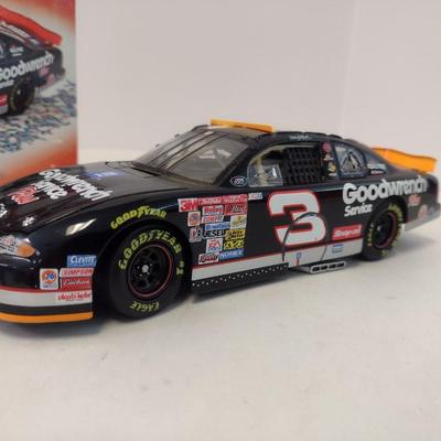 Sale Photo Thumbnail #935: Action Racing No Bull Limited Edition Dale Earnhardt 76th Win 2000 Monte Carlo GM Goodwrench with Original Box.  No Bull edition is replica condition of finish line car.