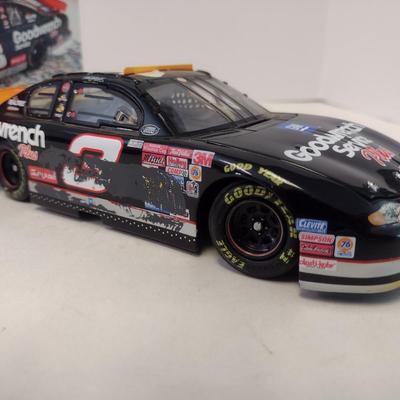 Sale Photo Thumbnail #937: Action Racing No Bull Limited Edition Dale Earnhardt 76th Win 2000 Monte Carlo GM Goodwrench with Original Box.  No Bull edition is replica condition of finish line car.