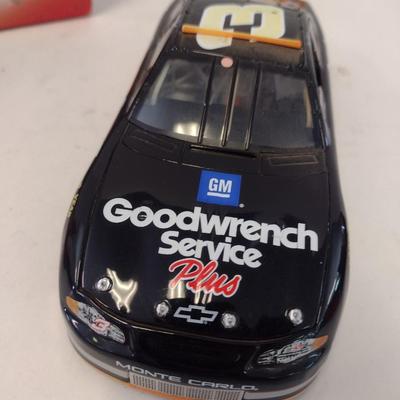 Sale Photo Thumbnail #936: Action Racing No Bull Limited Edition Dale Earnhardt 76th Win 2000 Monte Carlo GM Goodwrench with Original Box.  No Bull edition is replica condition of finish line car.