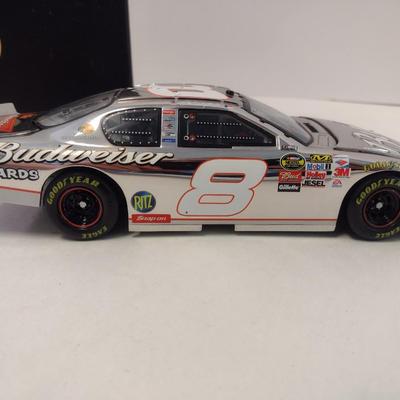 Sale Photo Thumbnail #1055: Motorsports Authentic Elite Rare Dale Earnhardt, Jr. Limited Edition Die Cast #8 NASCAR 2006 Monte Carlo SS Elite with Registration in Original Box.  The extreme limited edition of this car along with the registration makes this a rare and highly collecti