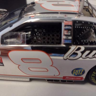 Sale Photo Thumbnail #1060: Motorsports Authentic Elite Rare Dale Earnhardt, Jr. Limited Edition Die Cast #8 NASCAR 2006 Monte Carlo SS Elite with Registration in Original Box.  The extreme limited edition of this car along with the registration makes this a rare and highly collecti