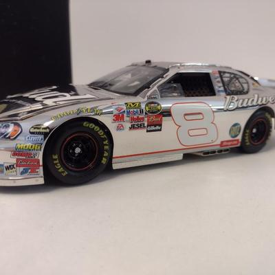 Sale Photo Thumbnail #1053: Motorsports Authentic Elite Rare Dale Earnhardt, Jr. Limited Edition Die Cast #8 NASCAR 2006 Monte Carlo SS Elite with Registration in Original Box.  The extreme limited edition of this car along with the registration makes this a rare and highly collecti