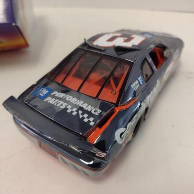 Sale Photo Thumbnail #1072: Action Dale Earnhardt Extreme Limited Edition 1997 Monte Carlo #3 GM Goodwrench NASCAR Die Cast Stock Car in Original Box.  Raced version is the replica finish condition of the car at race end.