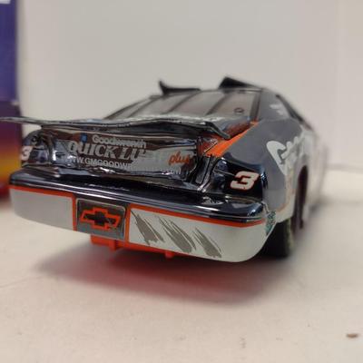 Sale Photo Thumbnail #1073: Action Dale Earnhardt Extreme Limited Edition 1997 Monte Carlo #3 GM Goodwrench NASCAR Die Cast Stock Car in Original Box.  Raced version is the replica finish condition of the car at race end.