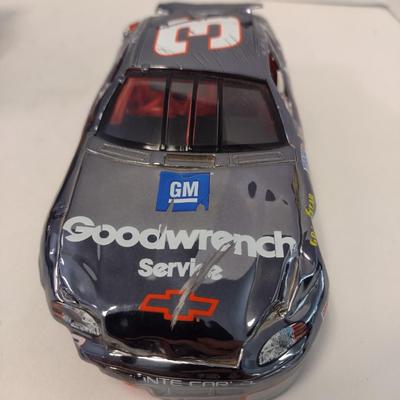 Sale Photo Thumbnail #1068: Action Dale Earnhardt Extreme Limited Edition 1997 Monte Carlo #3 GM Goodwrench NASCAR Die Cast Stock Car in Original Box.  Raced version is the replica finish condition of the car at race end.