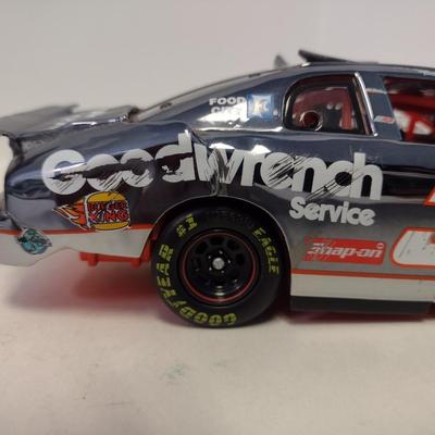 Sale Photo Thumbnail #1071: Action Dale Earnhardt Extreme Limited Edition 1997 Monte Carlo #3 GM Goodwrench NASCAR Die Cast Stock Car in Original Box.  Raced version is the replica finish condition of the car at race end.