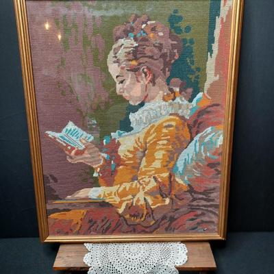 Sale Photo Thumbnail #58: Needlepoint Embroidery-
Fragonard's "Young Girl Reading" 
27x21
* Doily and wood riser not included