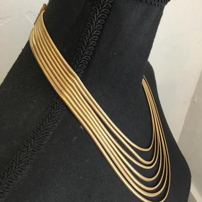Beautiful vintage, goldtone, multi strand, chain statement, necklace, beautiful bow clasp