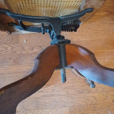 Sale Photo Thumbnail #136: Antique Cane/Wood Office Chair 
Cane seat in excellent condition