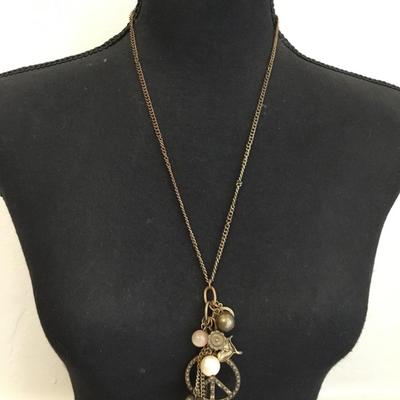 Cute vintage bronze, toned piece, charm, tassel necklace
