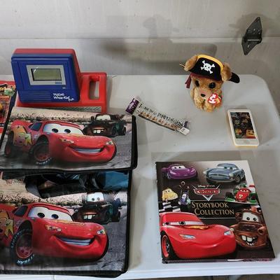 Sale Photo Thumbnail #167: Cars the movie book tote bag lot
Receive everything pictured
Includes two Shrek puzzles, vintage cartoon watches and other toys