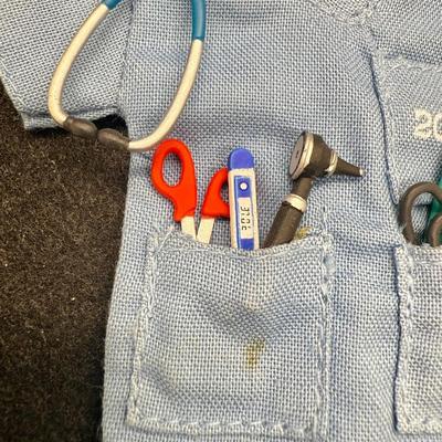 Sale Photo Thumbnail #490: Size of the coat is similar to Barbi clothes. Copat is on a hanger, with a stethoscope, scissors, thermometer, blood pressure cuff and otoscope. 30 service pins are for San Gabriel Valley medical center.