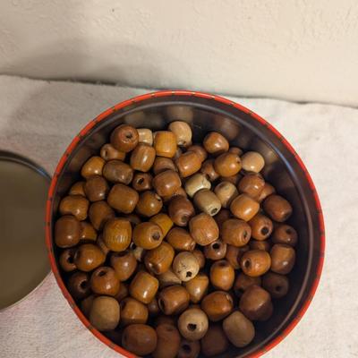 Sale Photo Thumbnail #169: Metal tin full of wood beads