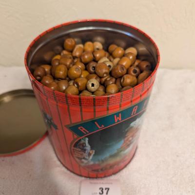 Sale Photo Thumbnail #168: Metal tin full of wood beads