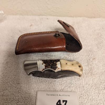 Sale Photo Thumbnail #217: folding knife with leather sheath