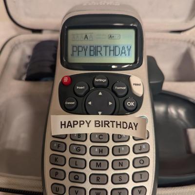 Sale Photo Thumbnail #524: DYMO label maker with case and label tape