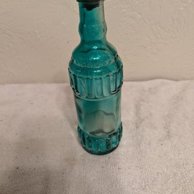 green glass bottle