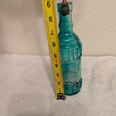 green glass bottle