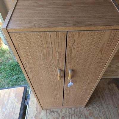 Storage cabinet 52 tall 12 in deep 31 in wide