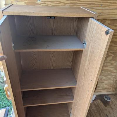 Storage cabinet 52 tall 12 in deep 31 in wide