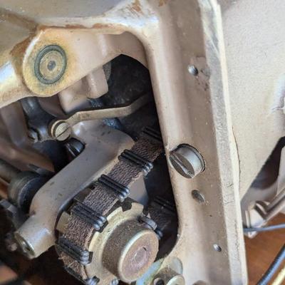 Singer sewing machine in cabinet