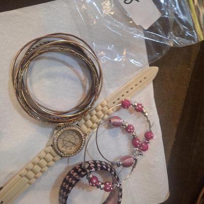 Sale Photo Thumbnail #727: bracelets, untested watch and earrings