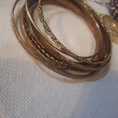 Sale Photo Thumbnail #728: bracelets, untested watch and earrings