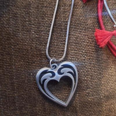 Sale Photo Thumbnail #760: 2 necklaces, and bracelet bangles