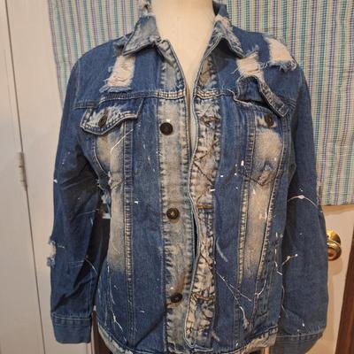 Sale Photo Thumbnail #863: this is a distressed look with large holes and paint splatter, it Is a women's M . This is for the jacket ONLy not the body form.
