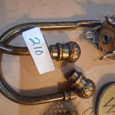 Sale Photo Thumbnail #874: one of the curtain tie backs is missing the set screw that holds the decorative end on it.