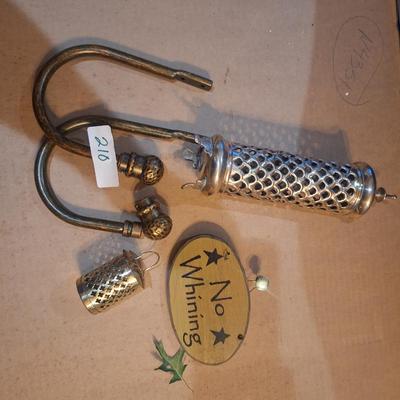 Sale Photo Thumbnail #873: one of the curtain tie backs is missing the set screw that holds the decorative end on it.