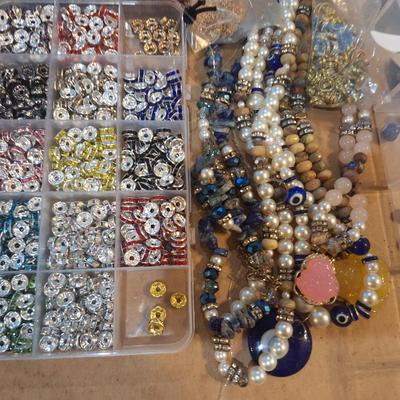 Sale Photo Thumbnail #923: beads, containers and a few partial finished jewelry pieces