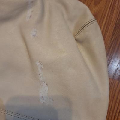 Sale Photo Thumbnail #1043: see all photos.  Not sure what the white stuff is on the back but it doesn't just wash off.  