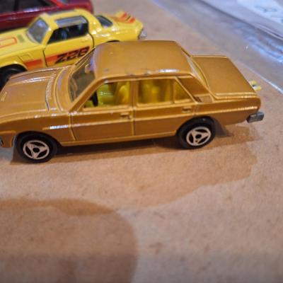 Sale Photo Thumbnail #1149: vintage pocket cars- tomica and lesney and other