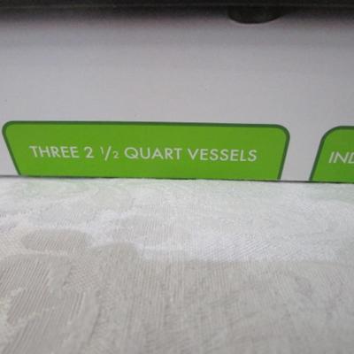 Sale Photo Thumbnail #2: Removable stoneware inserts, independent heat controls, tempered glass lids, 3 serving spoons included