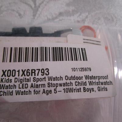 Sale Photo Thumbnail #221: Has chronogram mode, alarm mode, & normal time display mode.  Lights up. Includes instructions
