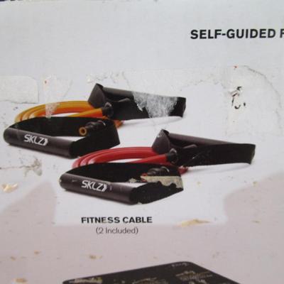 Sale Photo Thumbnail #234: Has 2 fitness cables, a trainer ball, & trainer mat
