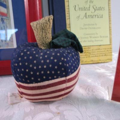 Sale Photo Thumbnail #352: 1 framed picture 15-1/2" x 13-1/2", pin cushon, metal flag, book on the constitution, picture in clear frame, 1 pamphlet on the constitution, 1 flag picture frame, 4 ornaments (liquid filled), basket