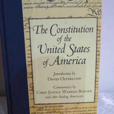Sale Photo Thumbnail #355: 1 framed picture 15-1/2" x 13-1/2", pin cushon, metal flag, book on the constitution, picture in clear frame, 1 pamphlet on the constitution, 1 flag picture frame, 4 ornaments (liquid filled), basket