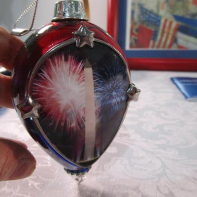 Sale Photo Thumbnail #342: 1 framed picture 15-1/2" x 13-1/2", pin cushon, metal flag, book on the constitution, picture in clear frame, 1 pamphlet on the constitution, 1 flag picture frame, 4 ornaments (liquid filled), basket