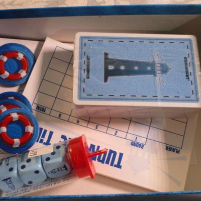 Sale Photo Thumbnail #500: 3 new Lighthouse candles, 1 decorative plate, New Turn The Tide game, wood lighthouse
