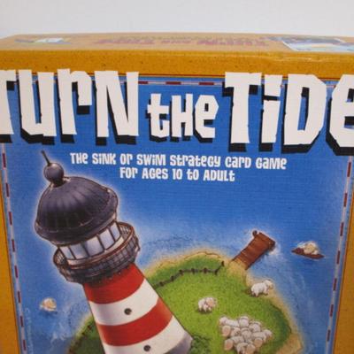 Sale Photo Thumbnail #499: 3 new Lighthouse candles, 1 decorative plate, New Turn The Tide game, wood lighthouse