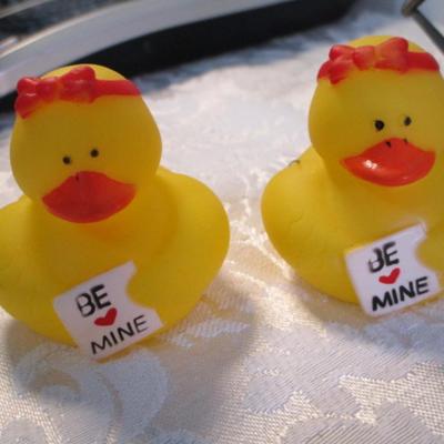 Sale Photo Thumbnail #525: Welcome plaque, Home Sweet Home chimes, rubber ducks, ceramic bunny, 2 small baskets, metal flowers in watering can, heart stress ball