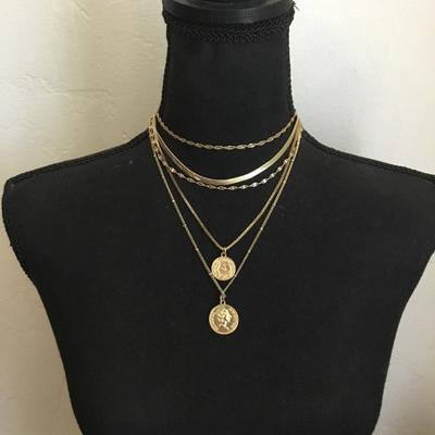Beautiful very nice gold toned, multi layered chain faux coin , necklace