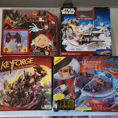 Sale Photo Thumbnail #198: Star trek USS Enterprise play set & Star Wars Echo base

Recieve all items pictured. Both play sets are brand new.