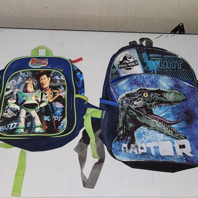 Sale Photo Thumbnail #223: Children's / Kids backpack lot Toy Story and raptor
Will receive both backpacks and are in great condition
