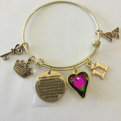 Beautiful, gold, toned, extendable charm bracelet very nice