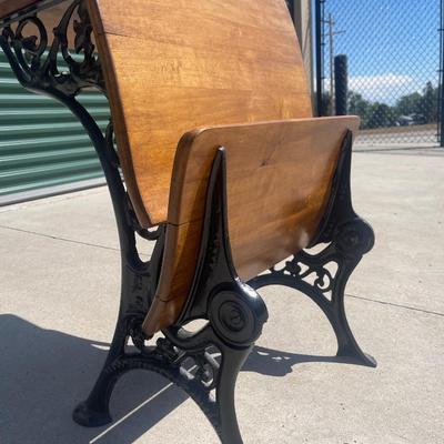 Sale Photo Thumbnail #31: Early 1900s Sears & Roebuck folding chair/desk combo with cast iron frame and solid wood seat, back, and desktop. Beautifully crafted with ornate side detailing and smooth folding seat. Great condition, clean wood surfaces and free of rust.