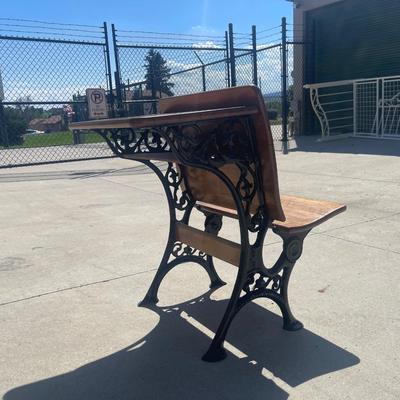 Sale Photo Thumbnail #24: Early 1900s Sears & Roebuck folding chair/desk combo with cast iron frame and solid wood seat, back, and desktop. Beautifully crafted with ornate side detailing and smooth folding seat. Great condition, clean wood surfaces and free of rust.